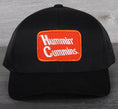 Load image into Gallery viewer, Vintage Hummin' Cummins patch on a Pacific 104C trucker hat
