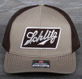 Load image into Gallery viewer, Vintage Schlitz Beer patch on a Richardson 112 trucker hat