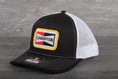 Load image into Gallery viewer, Vintage Champion patch on a Richardson 112 trucker hat