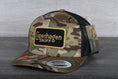 Load image into Gallery viewer, Vintage Copenhagen Snuff patch on a Yupoong 6606 MC Trucker