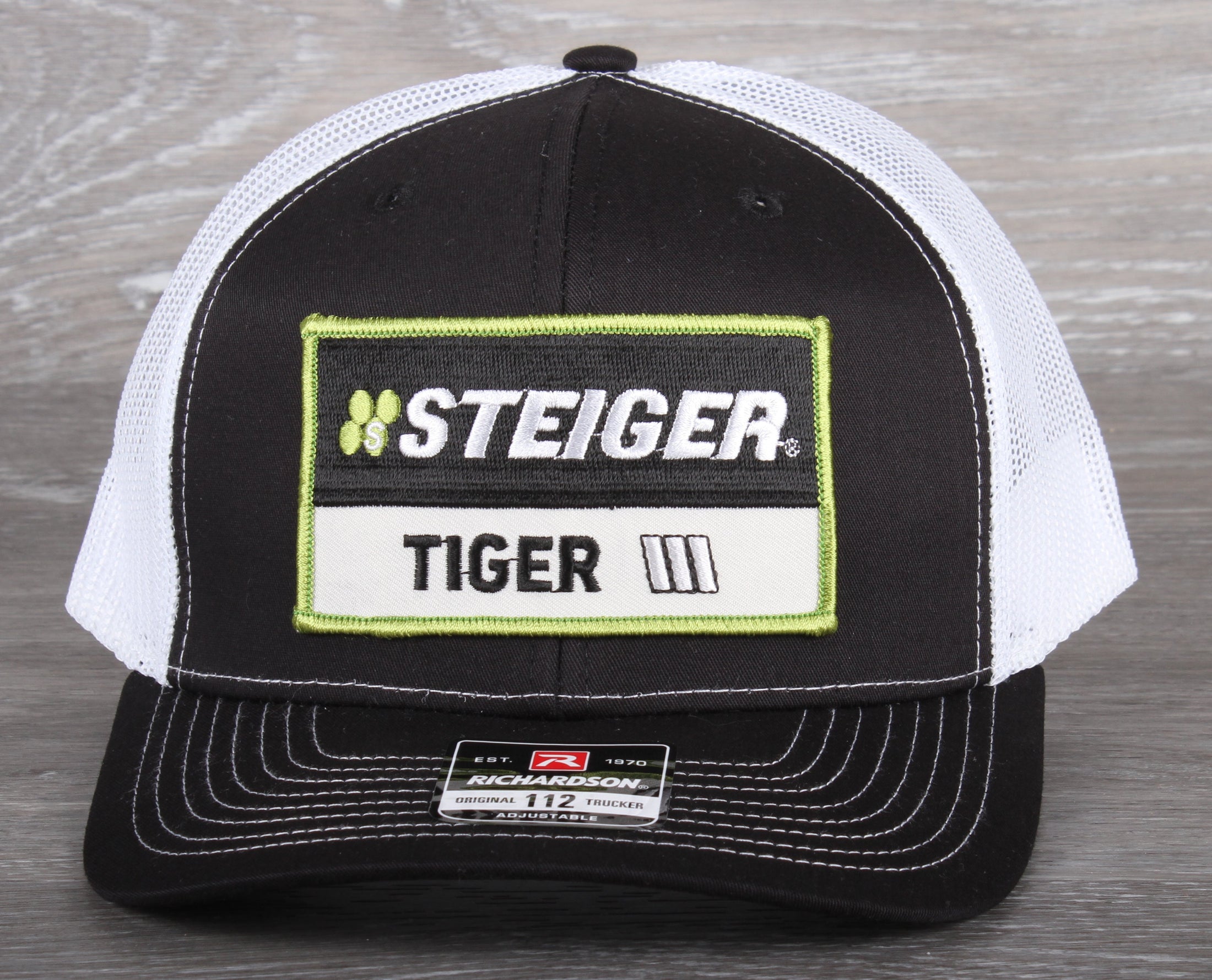 Steiger Tiger Tractor patch on a Richardson 112 trucker hat