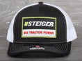 Load image into Gallery viewer, Steiger Big Tractor Power patch on a Richardson 112 trucker hat
