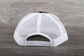 Load image into Gallery viewer, Steiger Big Tractor Power patch on a Richardson 112 trucker hat
