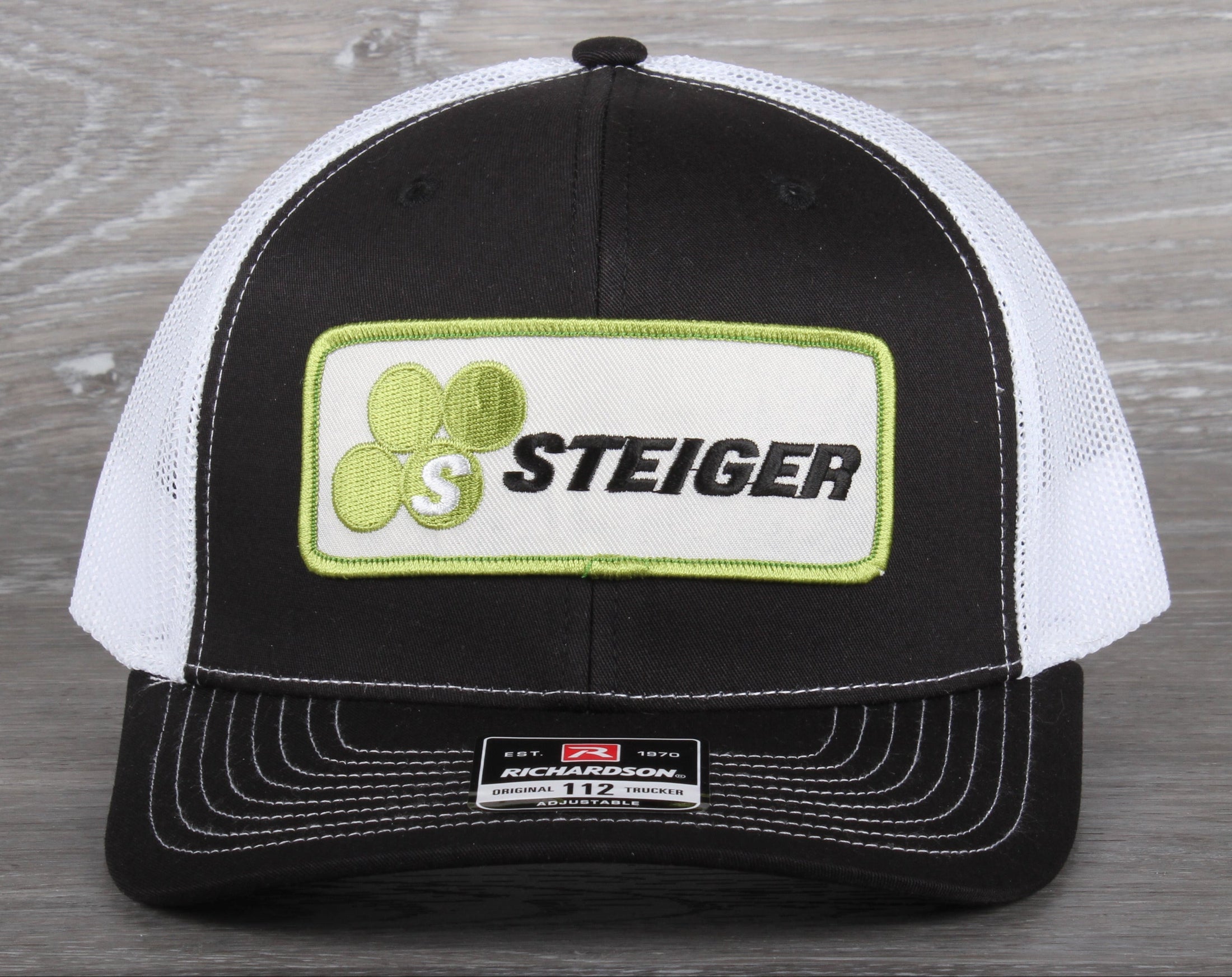 Steiger Tractor patch on a Richardson 112 trucker hat