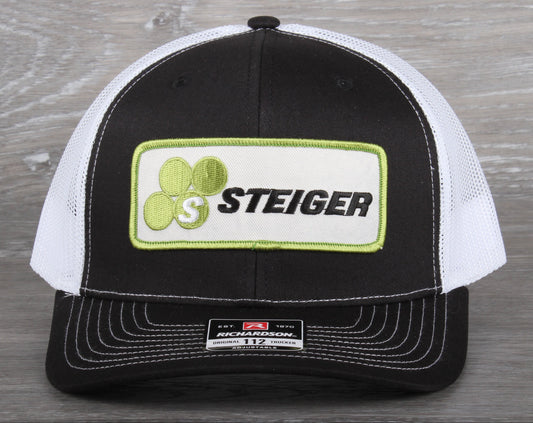 Steiger Tractor patch on a Richardson 112 trucker hat