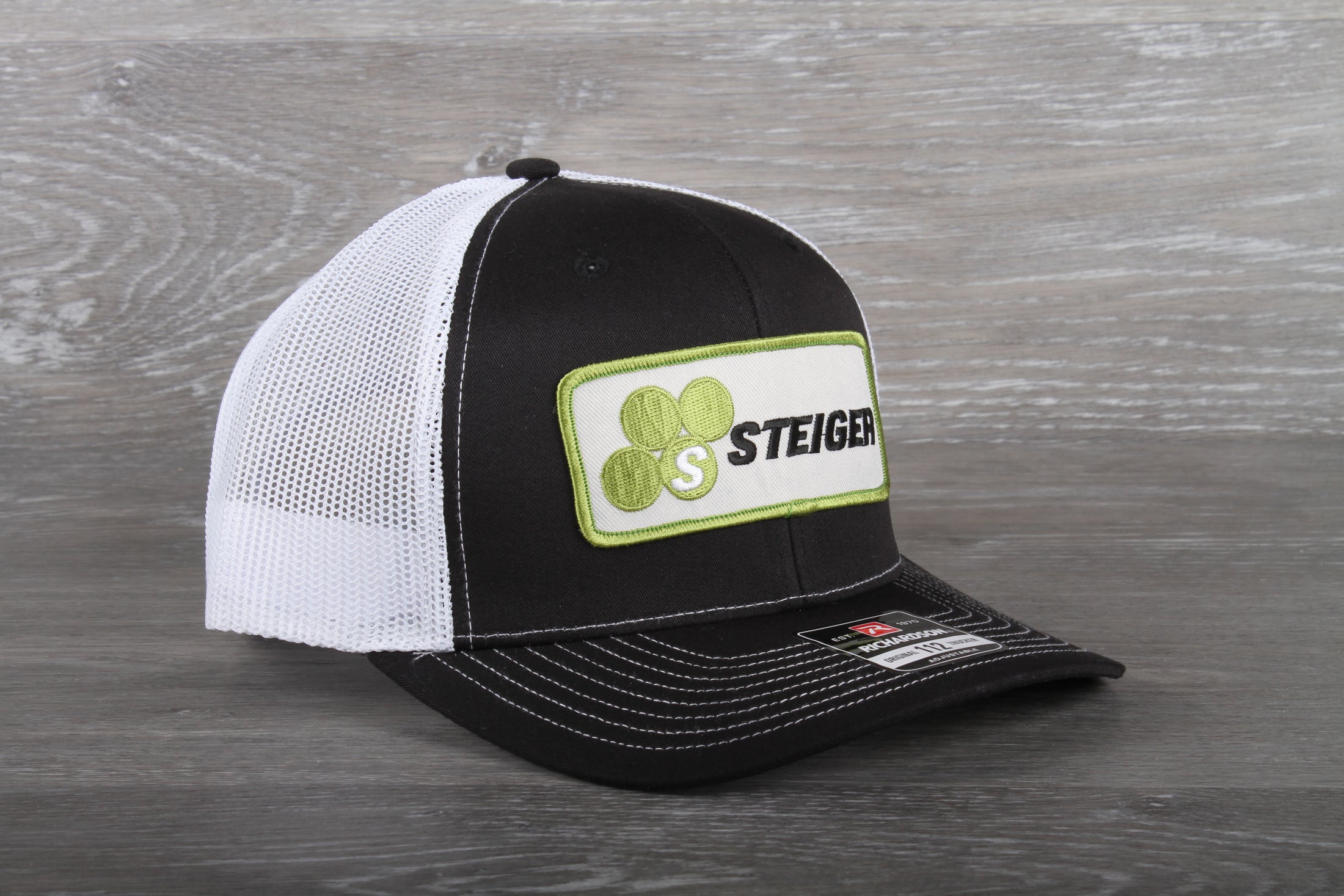 Steiger Tractor patch on a Richardson 112 trucker hat