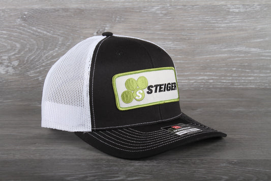 Steiger Tractor patch on a Richardson 112 trucker hat