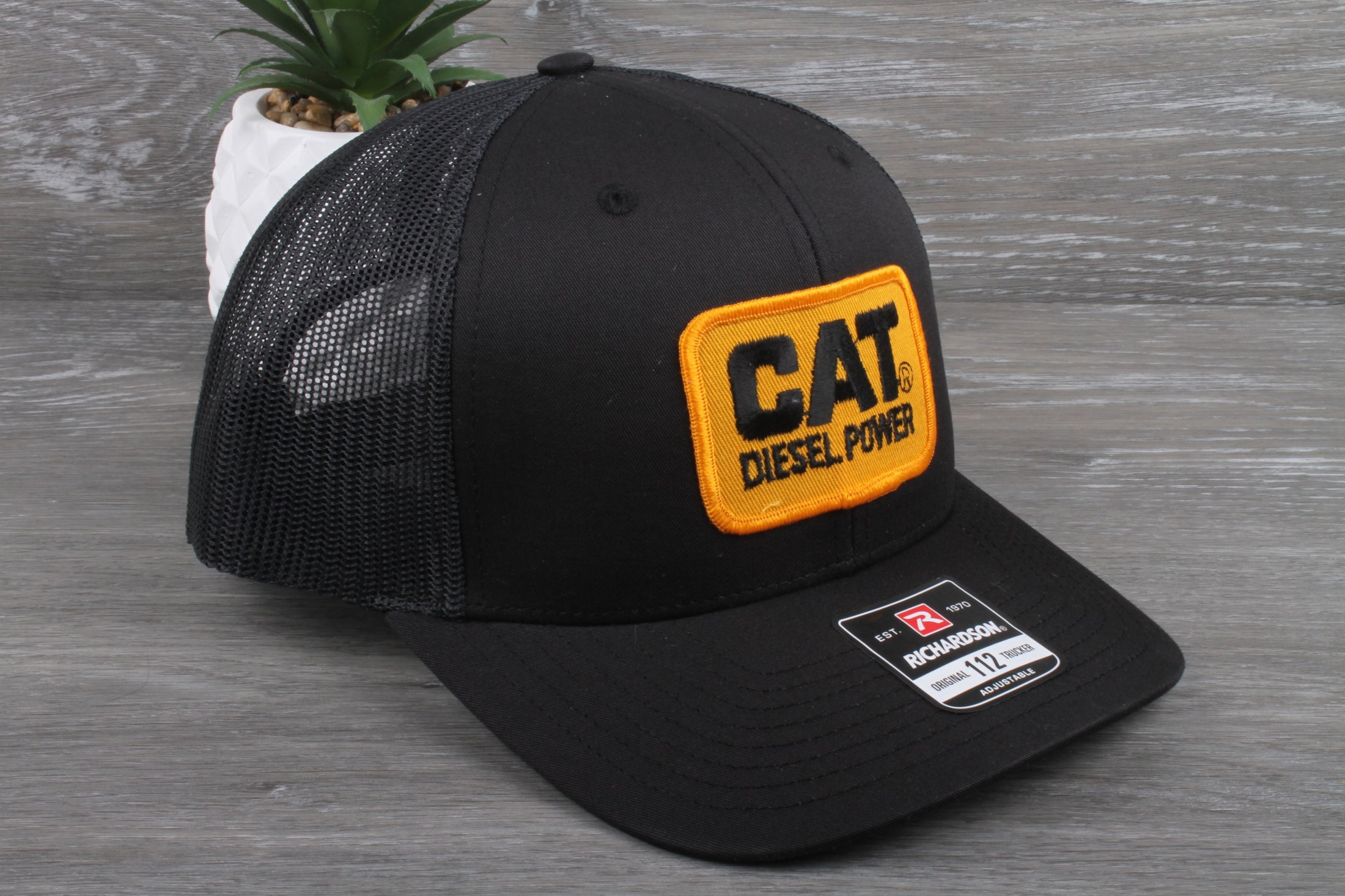 Vintage CAT Diesel Power patch on a Richardson 112 trucker hat