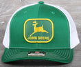 Load image into Gallery viewer, Vintage John Deere Green patch on a Richardson 112 trucker hat
