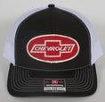 Load image into Gallery viewer, Vintage Chevrolet patch on a Richardson 112 trucker hat

