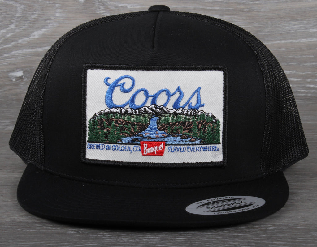 Vintage Coors patch on a Yupoong 6006 flatbill trucker