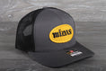 Load image into Gallery viewer, Vintage Midas Muffler patch on a Richardson 112
