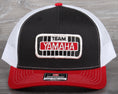 Load image into Gallery viewer, Vintage Team Yamaha patch on a Richardson 112 trucker hat
