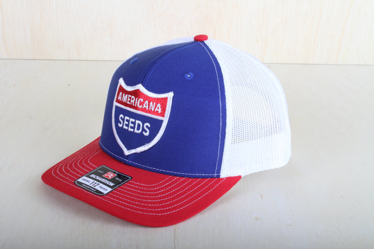 Vintage Americana Seeds patch on a Richardson 112 trucker hat
