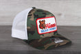 Load image into Gallery viewer, Vintage Hamm's Bear Power patch on a Richardson 112 camo trucker hat
